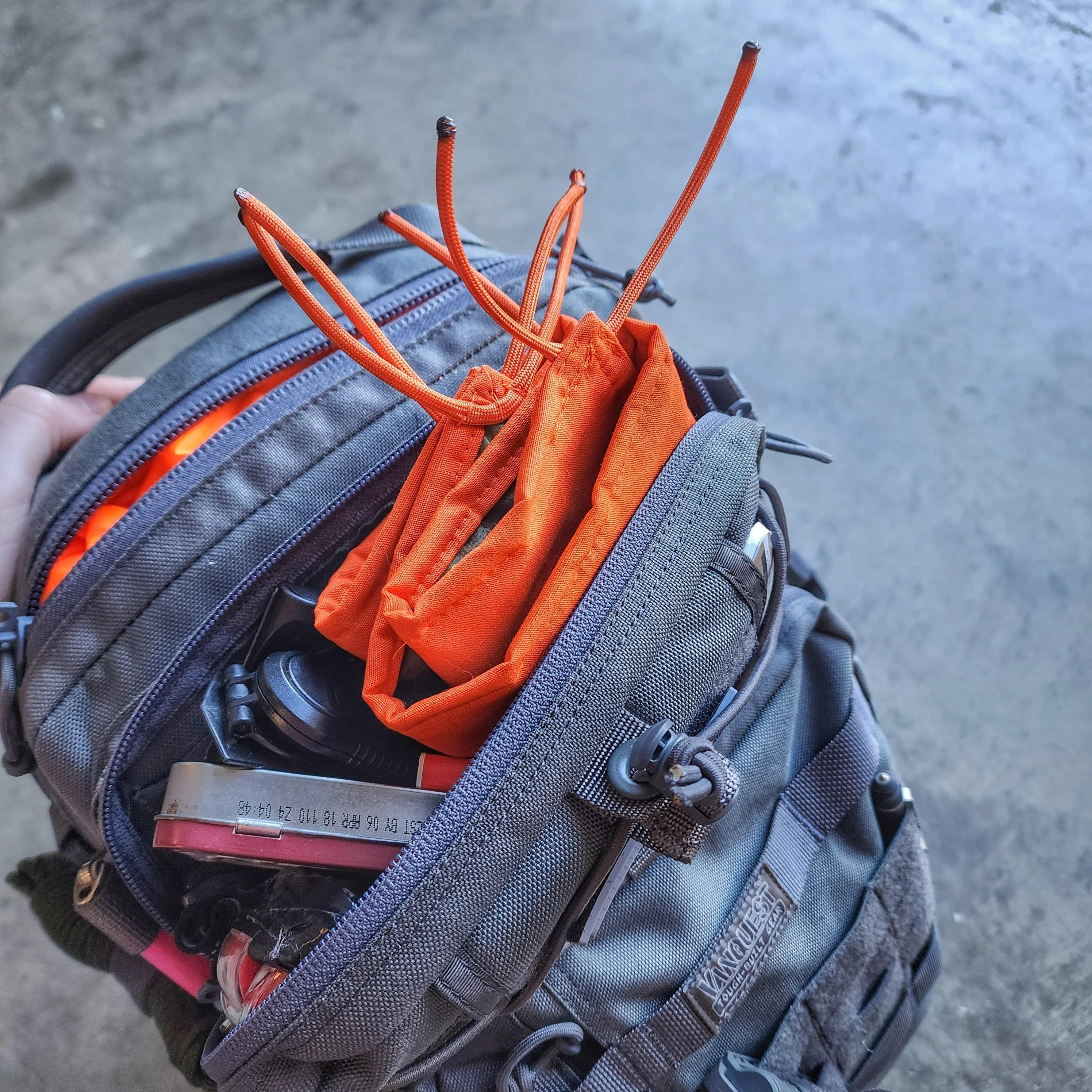 Woobie Hank: Insulated with USGI poncho-liner, serves as a large rag, knee pad, and adventure companion tool. - Image 11