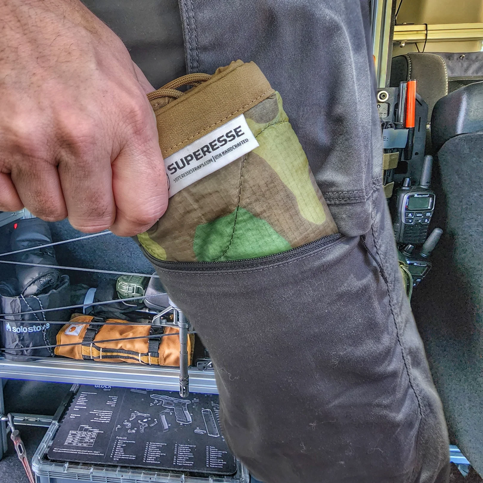 Woobie Hank: Insulated with USGI poncho-liner, serves as a large rag, knee pad, and adventure companion tool. - Image 7